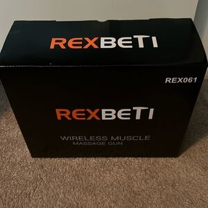Rexbeti Wireless Massaging Gun, NIB, REX 061